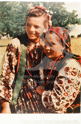 A girl and a young woman in festive costumes. Stanislav region.