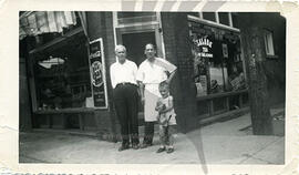 Nick Gaudun and little Teddy in front of their Red and White Store Grocery, Hamilton circa 1948