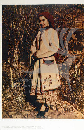 A woman in an embroidered coat (svyta). L'viv region.