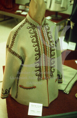 Modern women's coat with Ukrainian ethnic motifs.