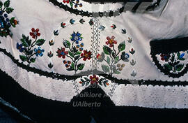 Embroidery with beads.